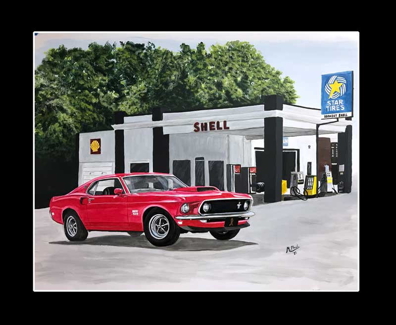 Red Boss 429 Mustang in front of Bookout Service Station